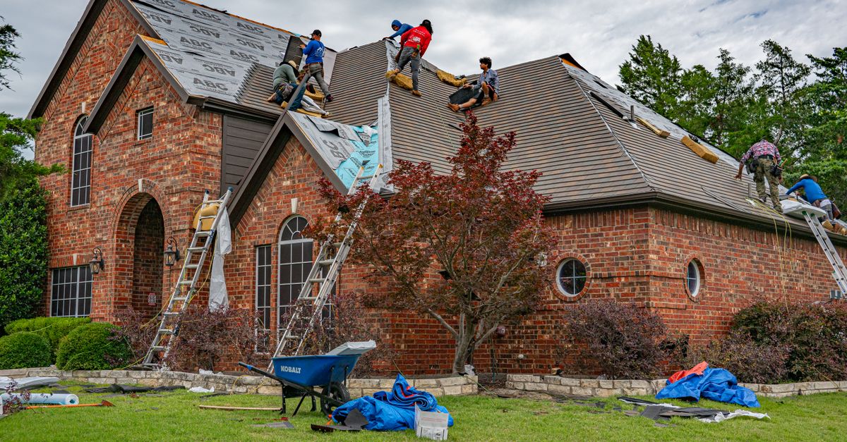 Roofers at work