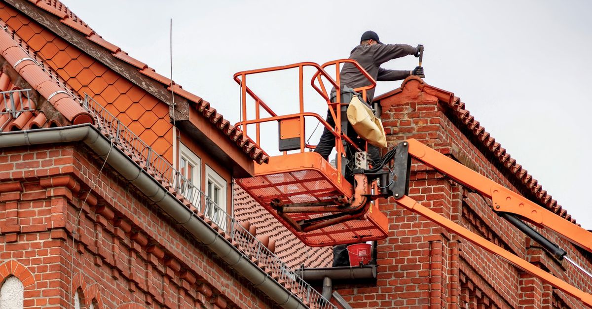 Roofers at work