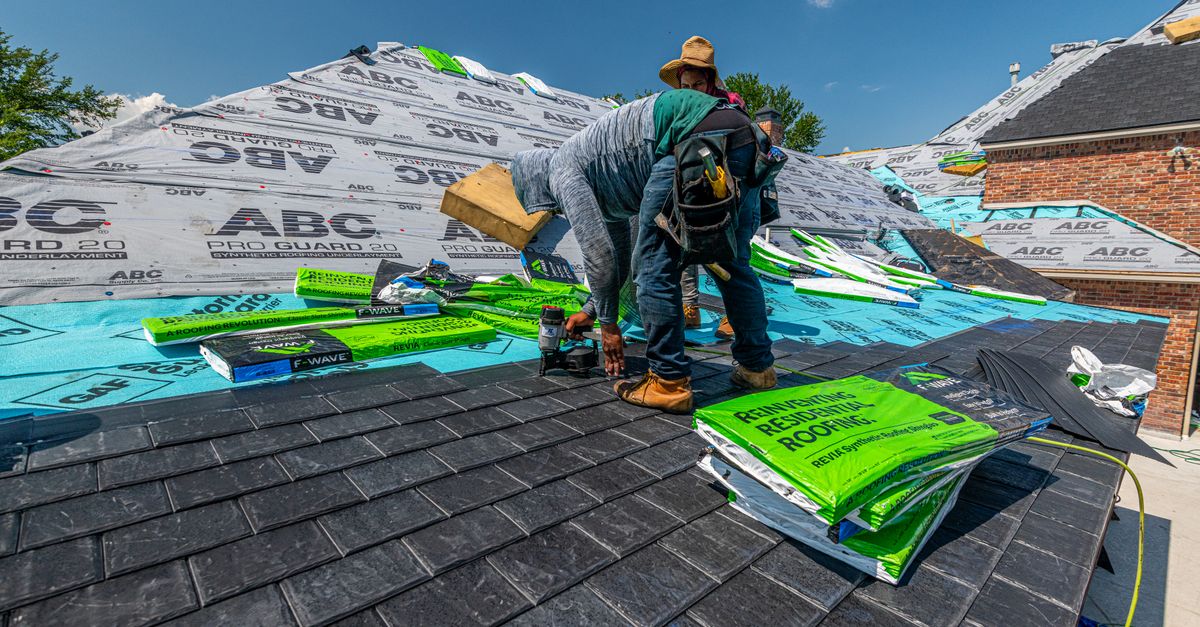 Roofers at work