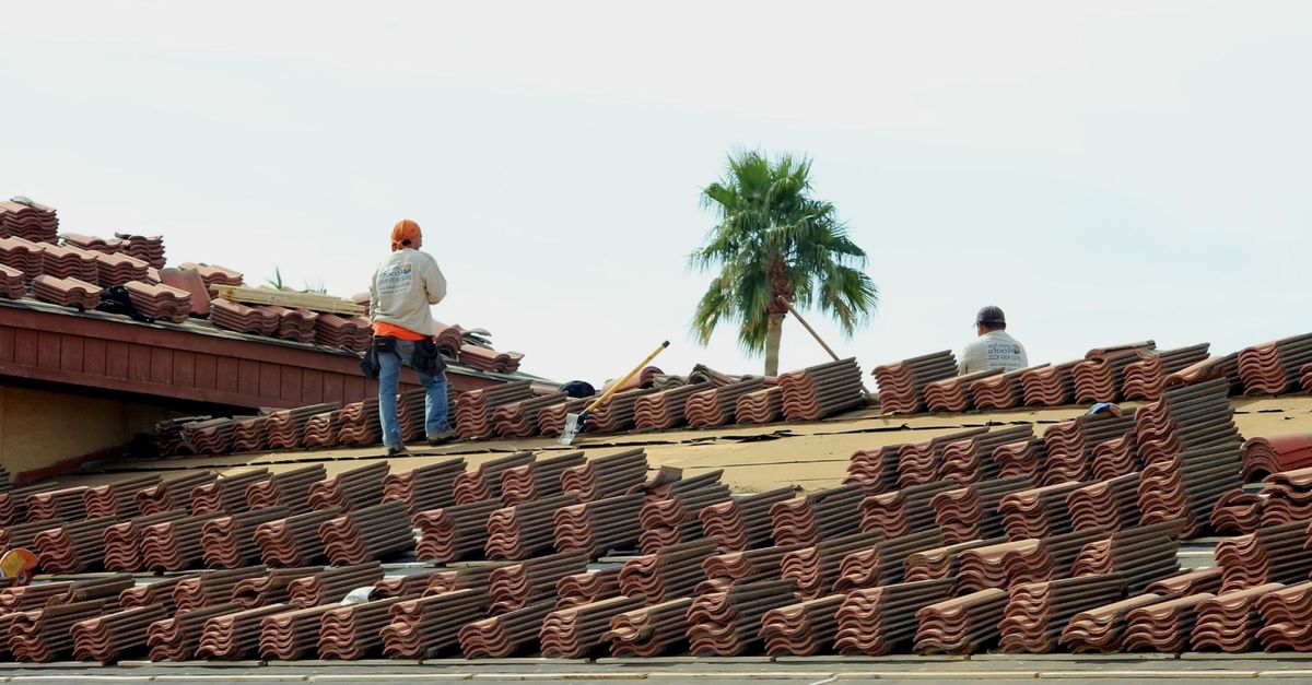 Roofers at work